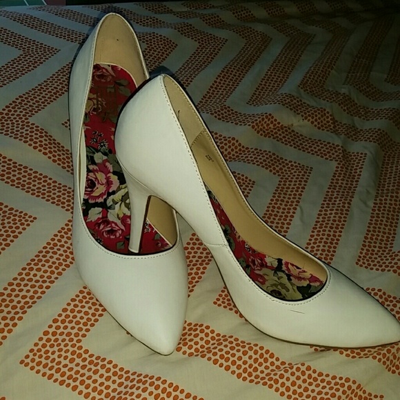 White pumps.