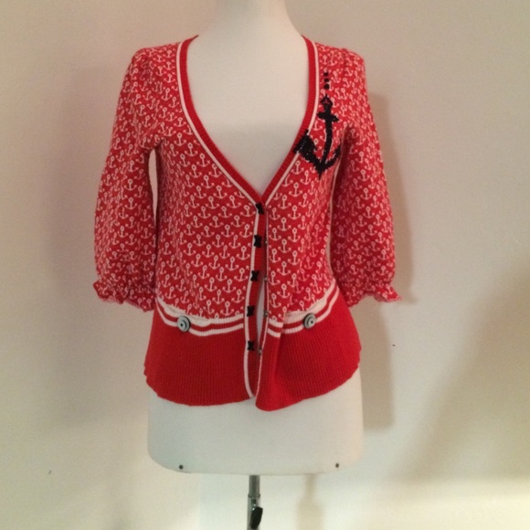 A red anchor sweater