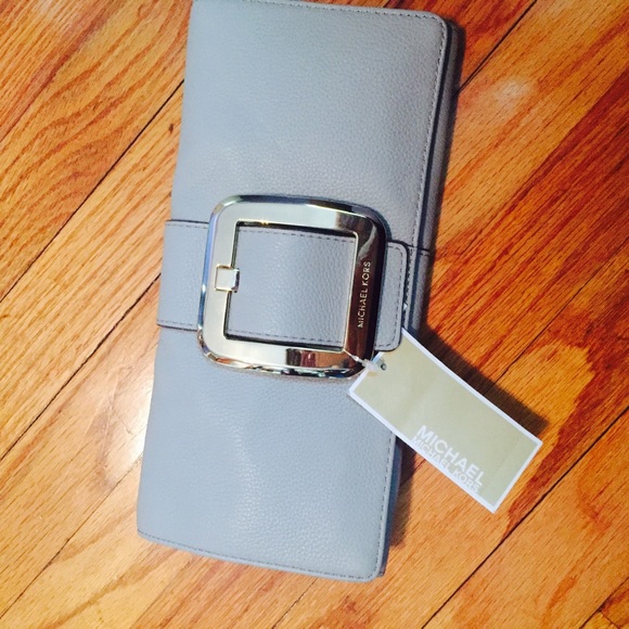 Michael Kors Sutton Leather clutch Brand New!