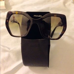 Tortoiseshell Prada sunglasses