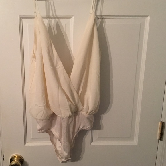 Never worn Plunge neck bodysuit