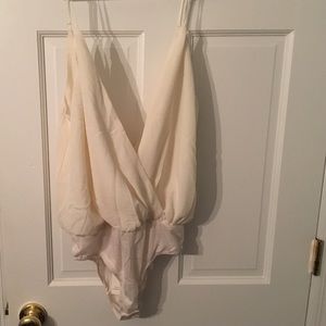 Never worn Plunge neck bodysuit