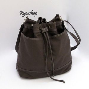 Gray Barrel Drawstring Bag
