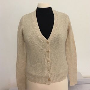 Ivory sweater from American Vintage.