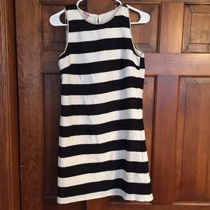 Small black and white scalloped shift dress