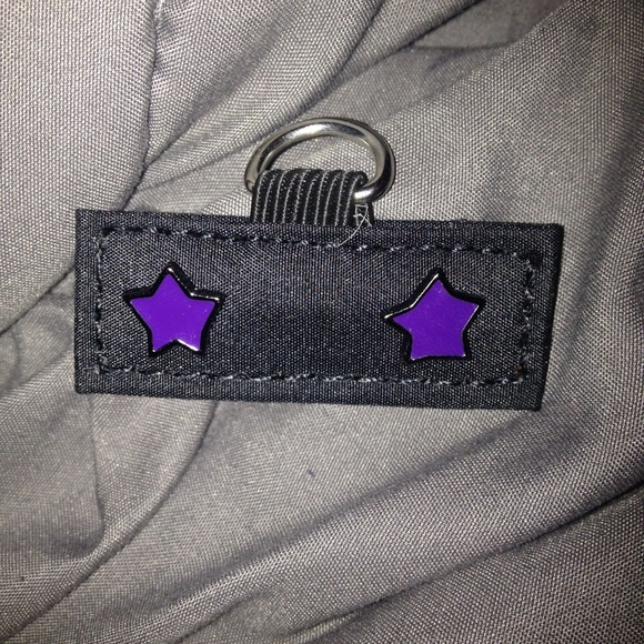 Marc Jacobs purple star earrings