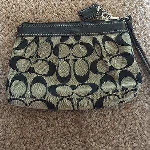 Authentic coach clutch