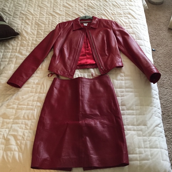 100% Leather. skirt is a size 4.  jacket size 6