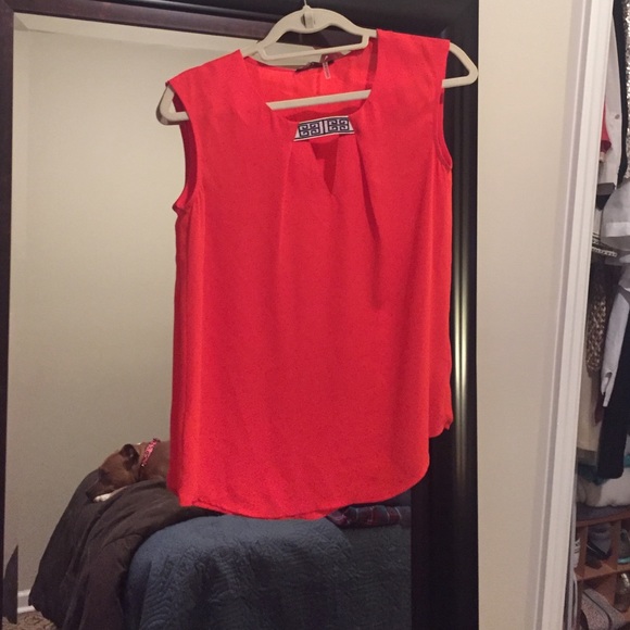 Orange sleeveless top