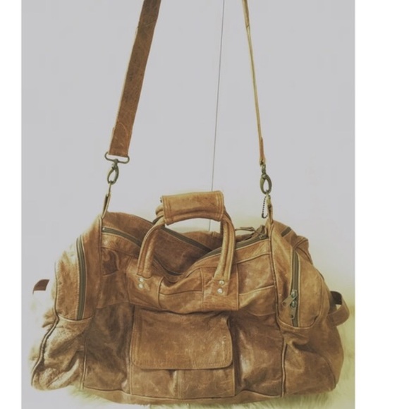 100% Authentic weathered brown leather travel bag
