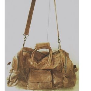 100% Authentic weathered brown leather travel bag