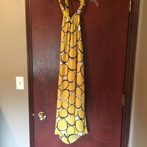 Yellow Polk a dot Haulter dress. Mid thigh length