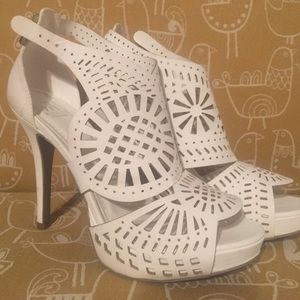 White lazer cut booties.