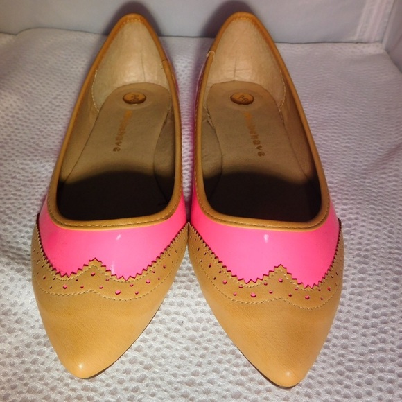 Hot pink and tan pointed flats