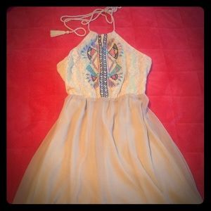 Tan short dress in perfect conditions worn once.