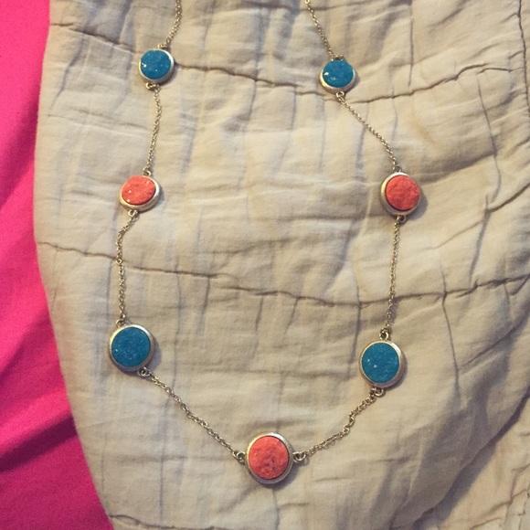 Long gemstone necklace with gold chain