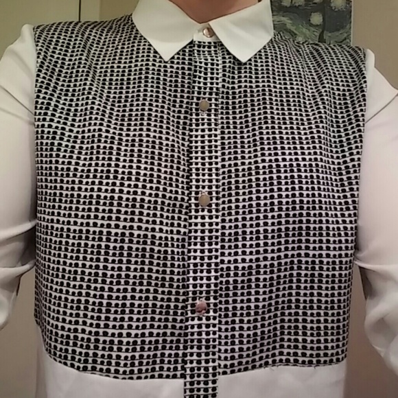 White and black polka dot blouse