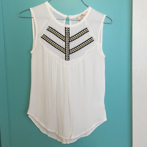 White sleeveless blouse
