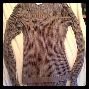 Brown sweater with holes all over