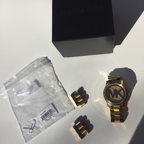 MK gold watch