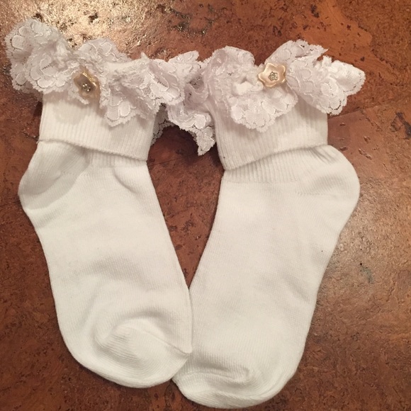 White children socks with pink flower decor