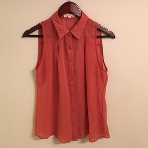 Sheer rust colored blouse