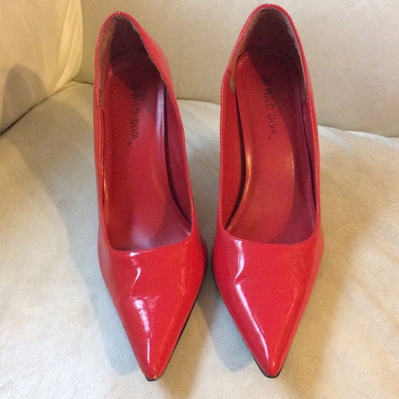 Pointy toed red heels