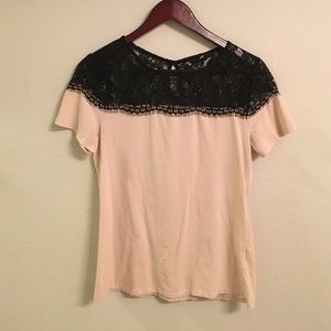 Light pink shirt with black lace shoulders