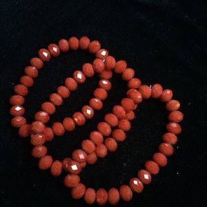 Red bead bracelet trio