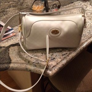 Authentic white on white Gucci with long strap.