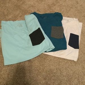 Bundle of men's blue crown v-necks size large