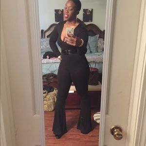 Black flare leg plunge neck jumpsuit. Worn once