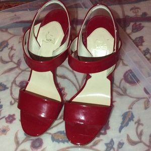 Christian Louboutin red pumps