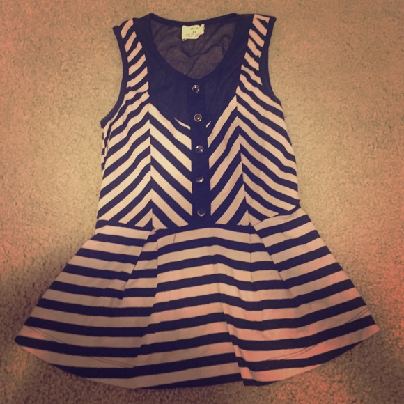 Tan and black peplum top