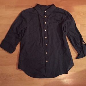 Blue button down shirt.