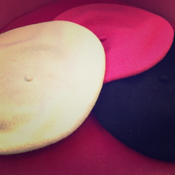 Three tam hats in pink, black and cream