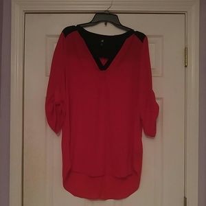 Red and black high low blouse