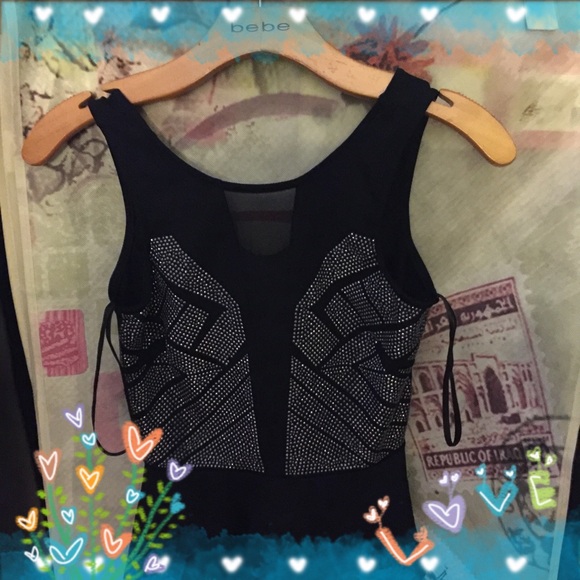 BEBE SLEEVELESS PEPLUM TOP