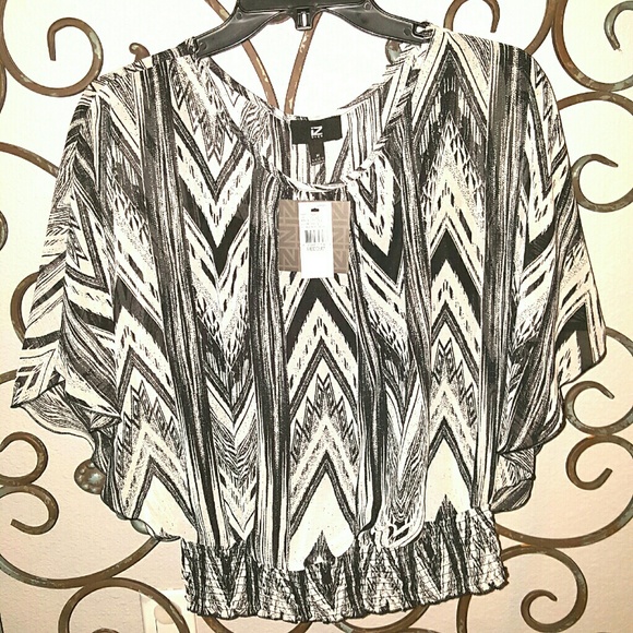 New Medium sheer  print blouse