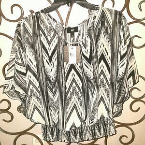 New Medium sheer  print blouse