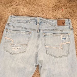 Light wash distressed American eagle skinny jeans