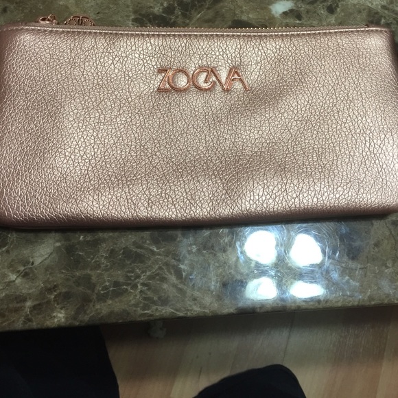Brand new Zoe Eva clutch
