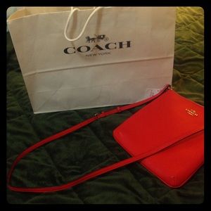 Coach orange tote.
