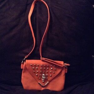 Orange leather handbag