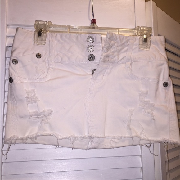 White ripped up mini skirt by Guess
