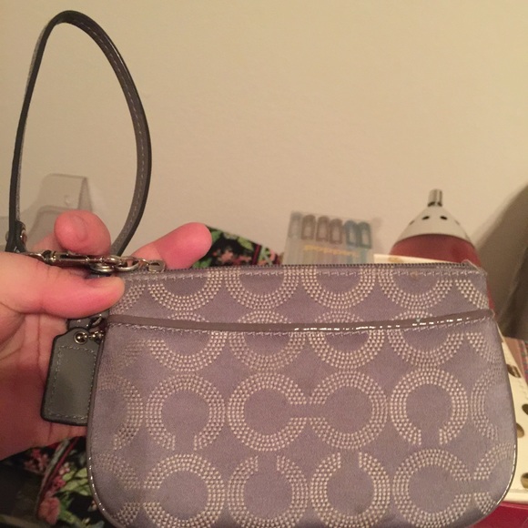 Small grey Auth. Coach wristlet