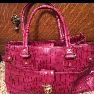 Pinkish purple Liz Claiborne pocketbook .