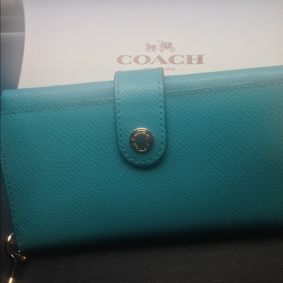 Authentic, cadet blue leather phone clutch.