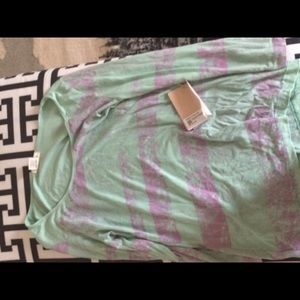 purple and greenish blueish shirt