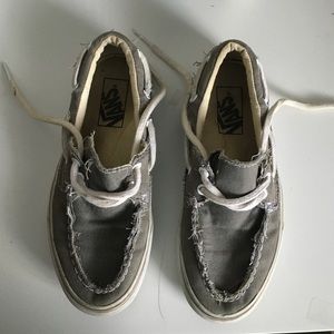 old worn out grey vans